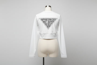 Recycled long-sleeve crop top in white — back view showing all-over print graphic design, UPF 50+